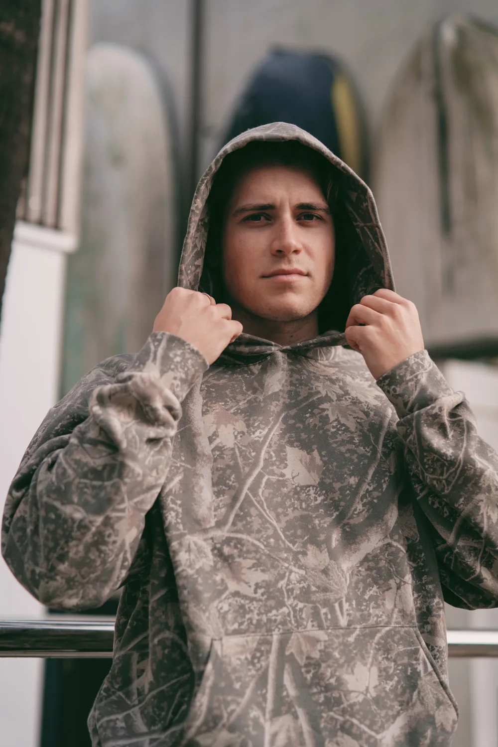 Man wearing a Deadwood Camo heavyweight hoodie